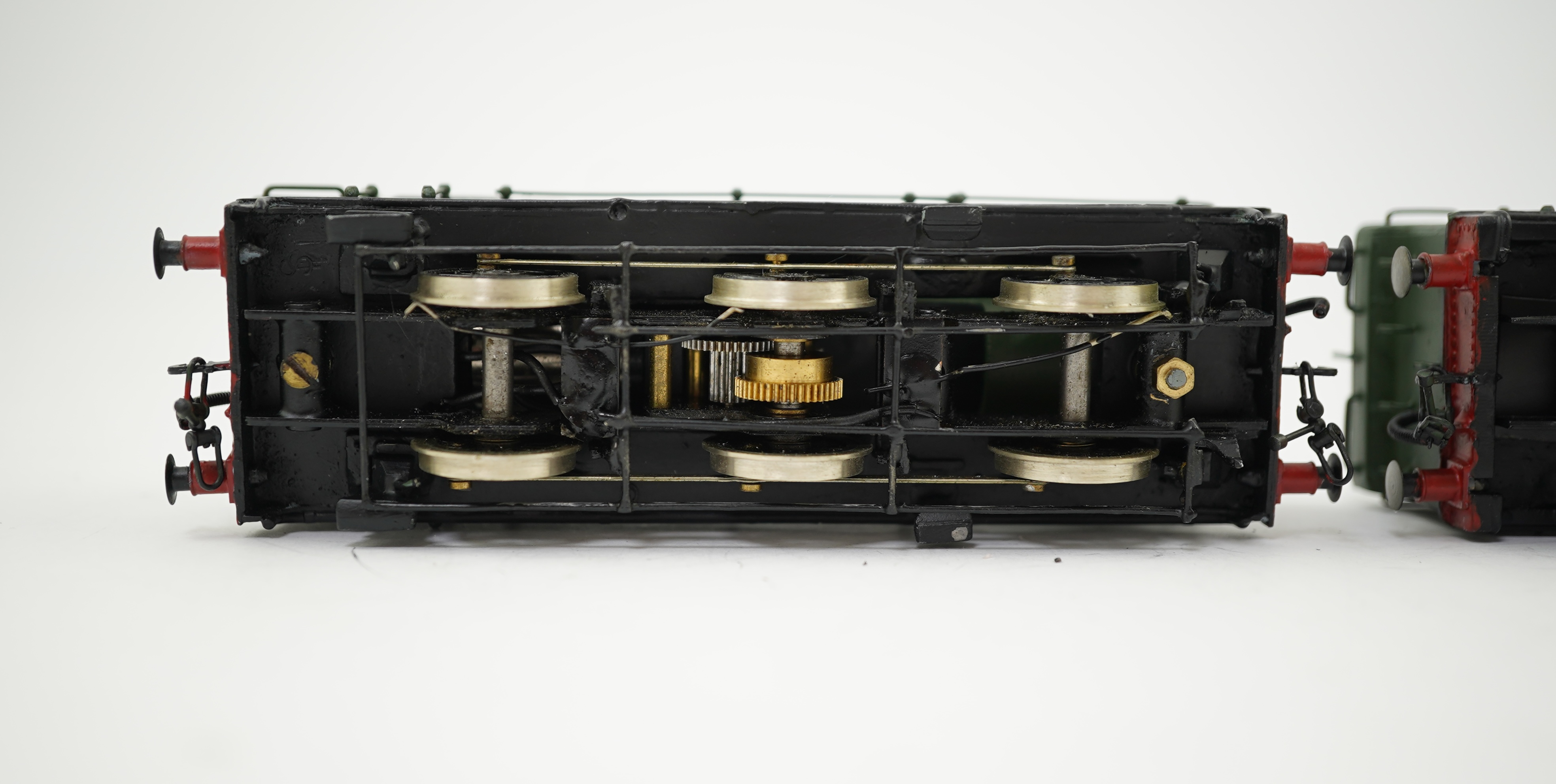 Two 00 gauge brass and white metal kit built GWR Pannier Tank locomotives; a 1600 class 0-6-0PT, 1600, together with an 7400 class 0-6-0PT, 7404, constructed, painted and lined to a high standard, both motored for two ra